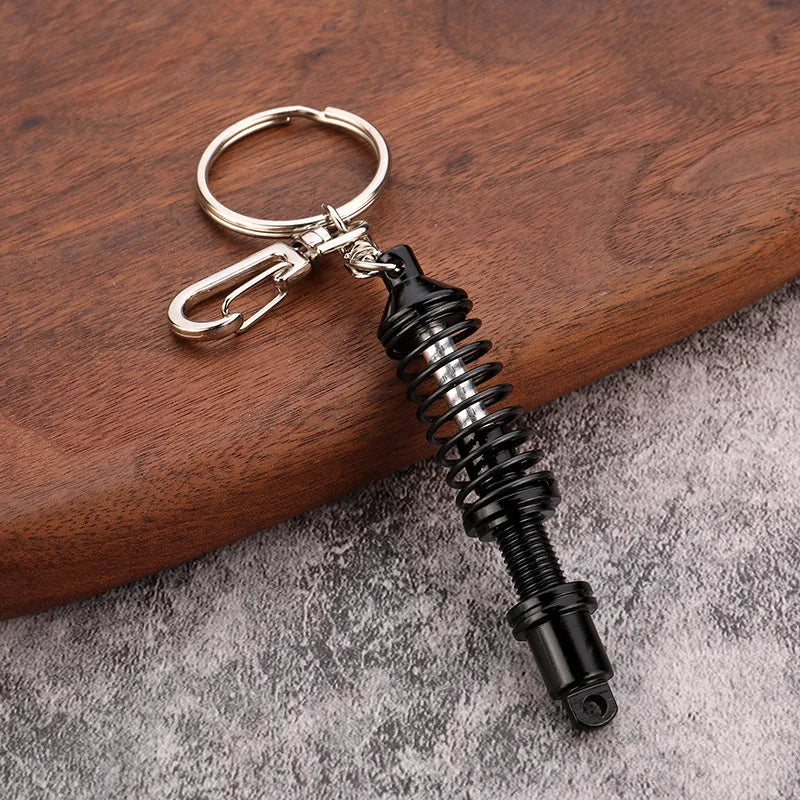 π Mini Shock Absorber Keychain β Functional Suspension Style!