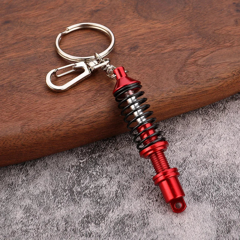 π Mini Shock Absorber Keychain β Functional Suspension Style!
