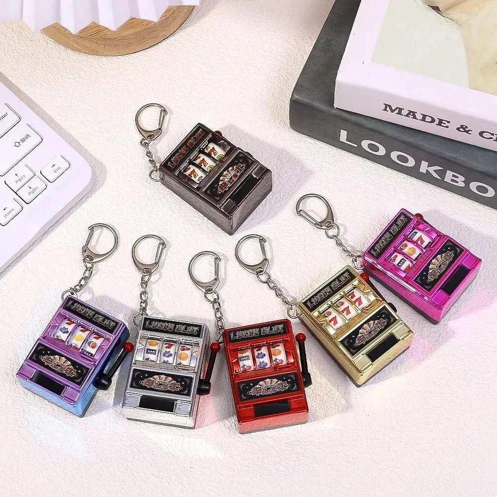 🎰✨ "LuckySpin™ Mini Slot Machine Keychain" ✨🔑